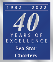 Blue and silver plaque celebrating 40 years of excellence (1982-2022) by Sea Star Charters.